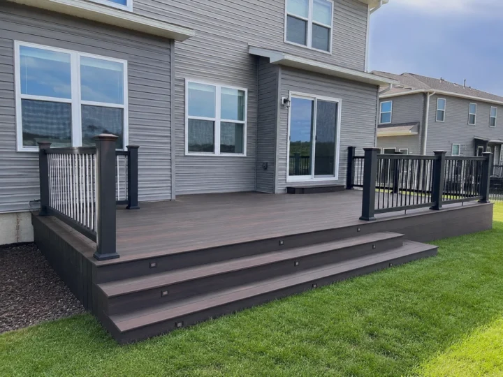 Brown composite ground level deck in Cedar Rapids, Iowa