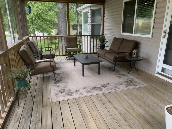Covered wood deck seating area in Cedar Rapids, Iowa