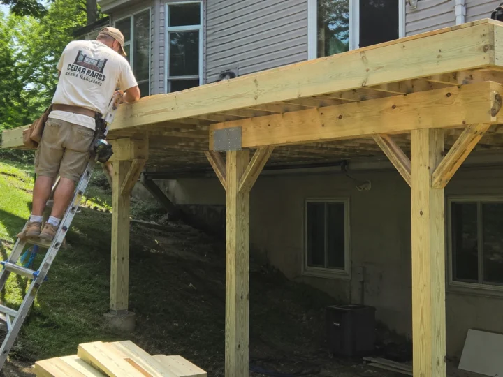 Elevated pressure treated deck framing in Cedar Rapids, Iowa