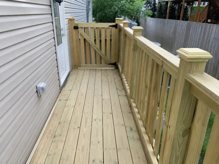 Narrow pressure treated side deck walkway in Ely, Iowa