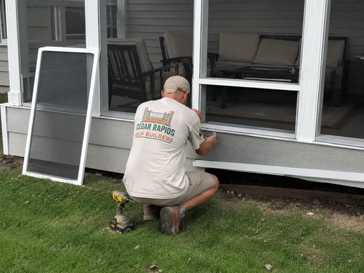 Installing screened porch exterior trim in Hiawatha, Iowa